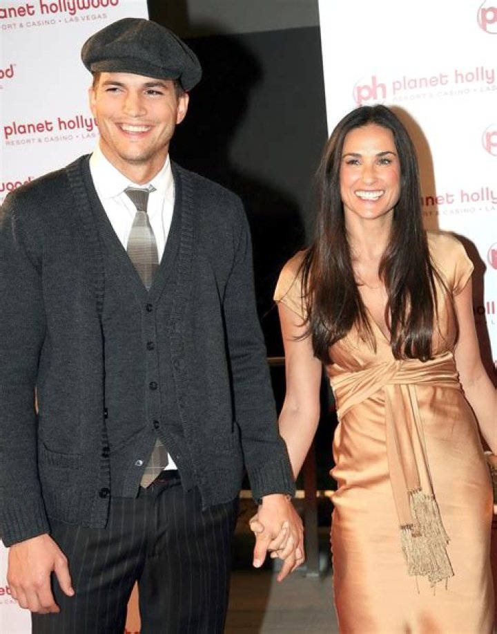 Ashton Kutcher is begging Demi Moore to divorce him, since he’s with Mila now