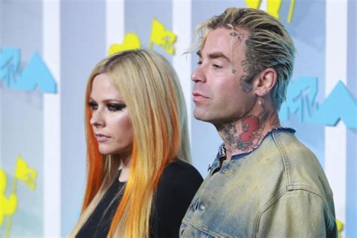 Avril Lavigne’s boyfriend, Mod Sun, got her name tattooed on his neck: true love?