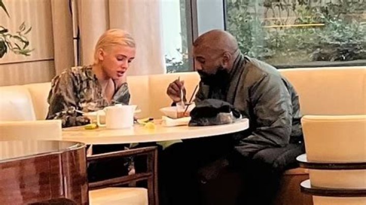 bitchy | Kanye West is in a good mood leaving his apartment in LA