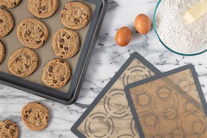 Do you have to spray silicone baking sheets?