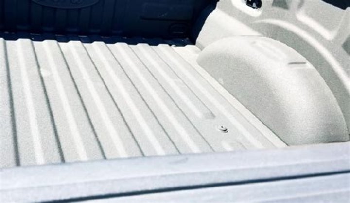 Does truck bed liner stick to wood?