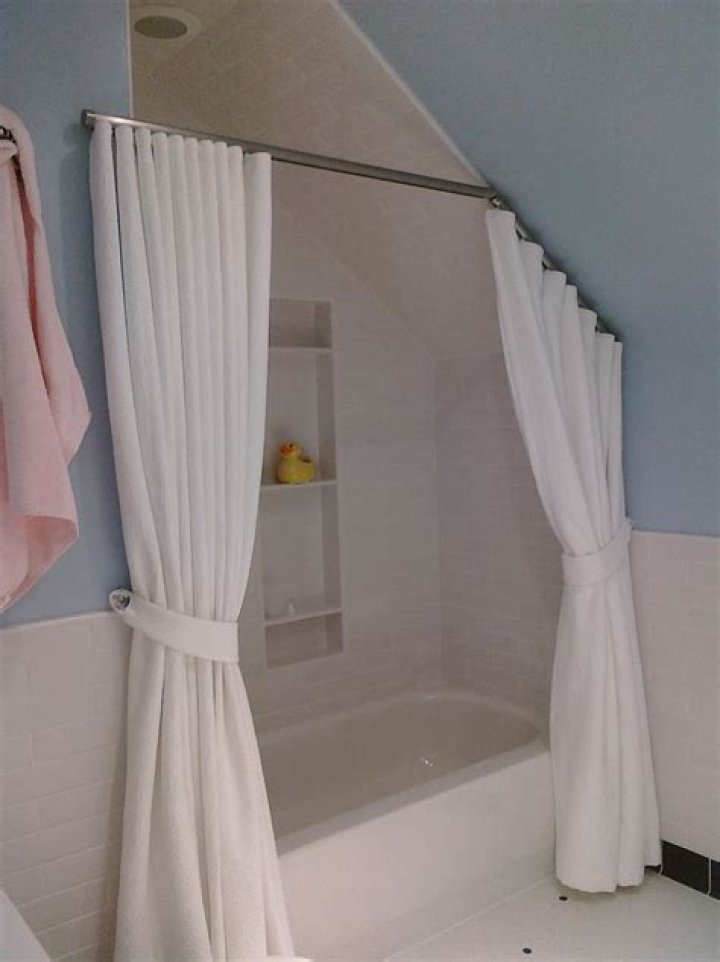 How do you hang a shower curtain on a slanted ceiling?