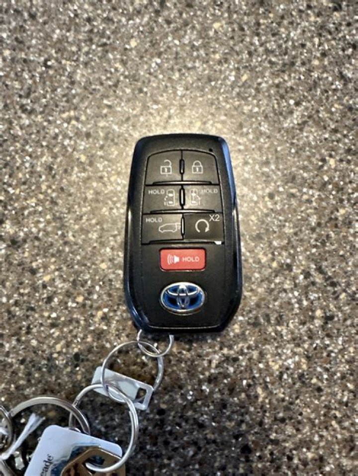 How do you program a 2009 Toyota Corolla remote?
