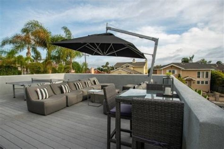 How do you replace an outdoor umbrella canopy?