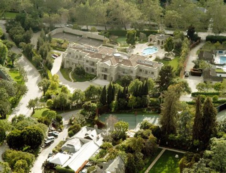 How much did Hugh Hefner buy the Playboy Mansion for?