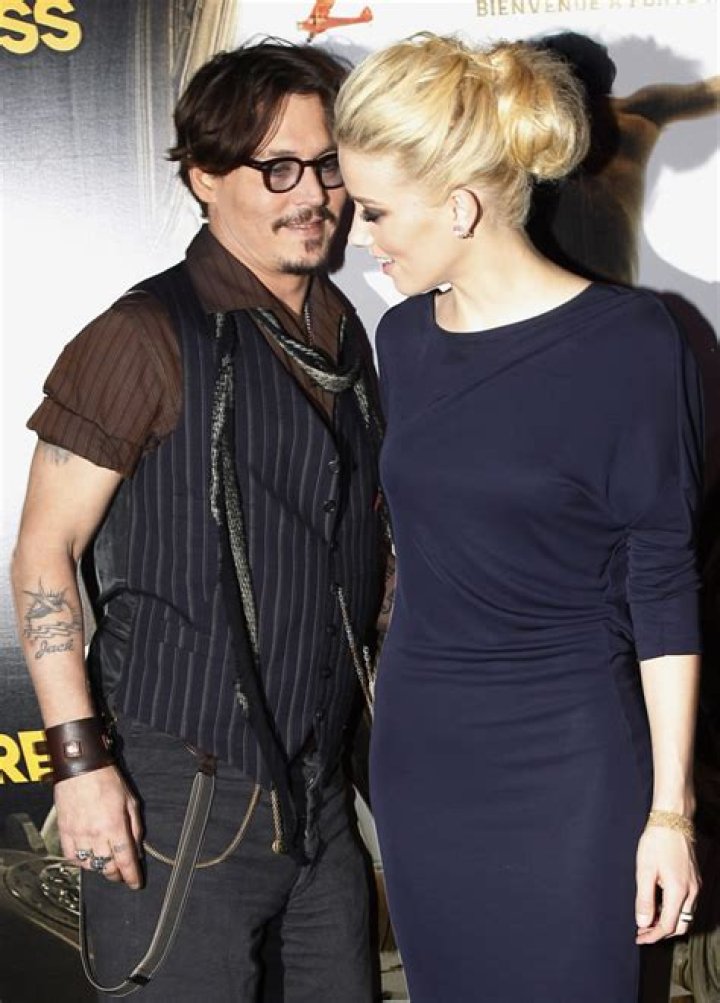 In Touch: Amber Heard nearly abandoned her lesbian ways for Johnny Depp