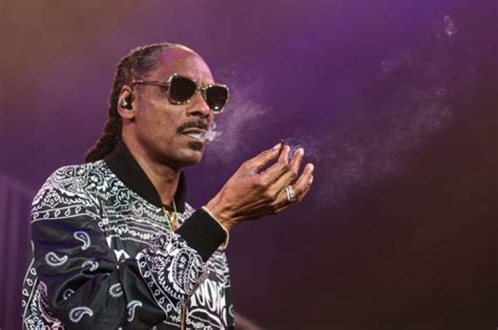 Is Snoop Dogg related to Wiz Khalifa?