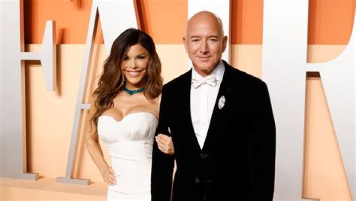 Jeff Bezos & Lauren Sanchez rang in the New Year at a huge party in St. Barts