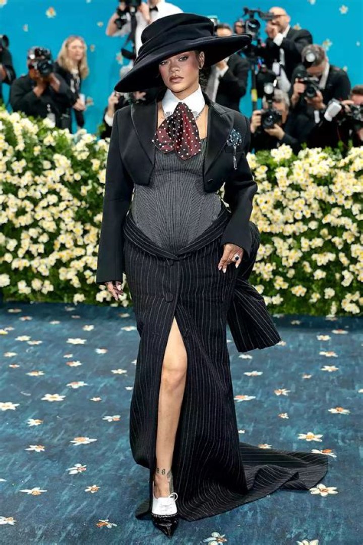 	Jeremy Pope slayed in a 33 foot train featuring Karl Lagerfeld’s face at the Met Gala	