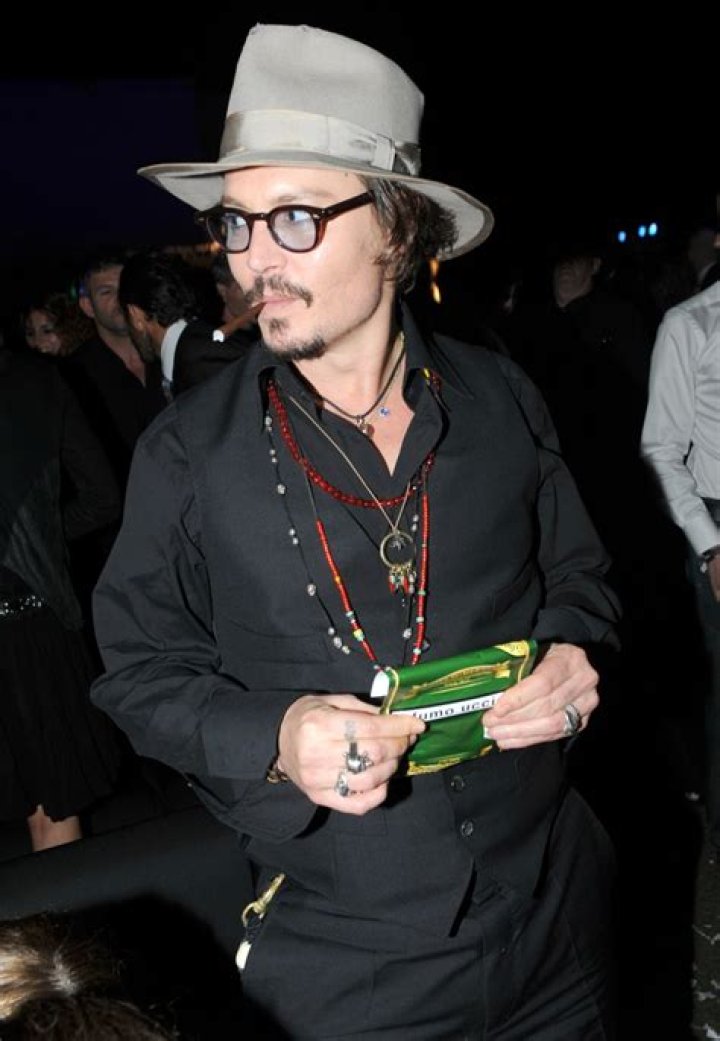 Johnny Depp wanted to wear footie pajamas & bunny ears for ‘The Tourist’