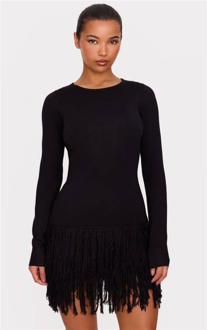 Kim Kardashian’s black suede t-neck dress, with fringe: amazing or terrible?