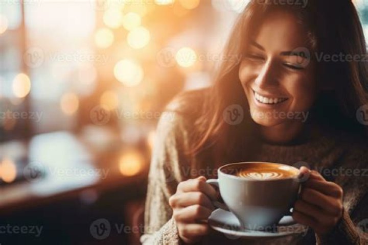 	Kylie Kelce sits in her car with a cup of coffee to get some peace in the mornings	