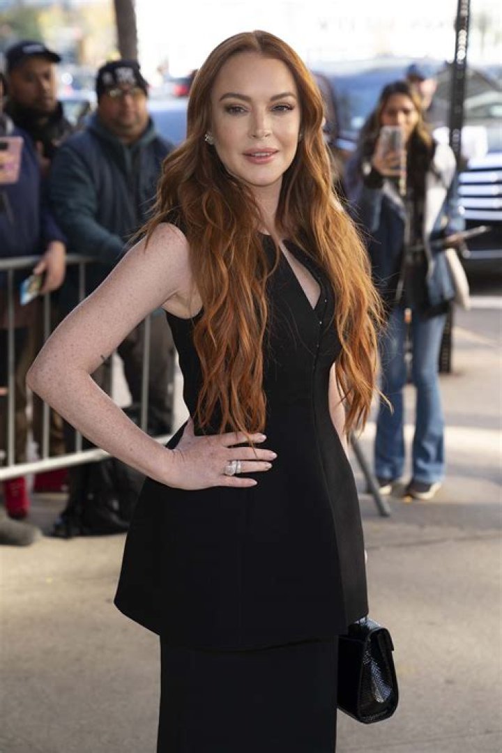 Lindsay Lohan opens two beach resorts and bags a reality show on MTV!