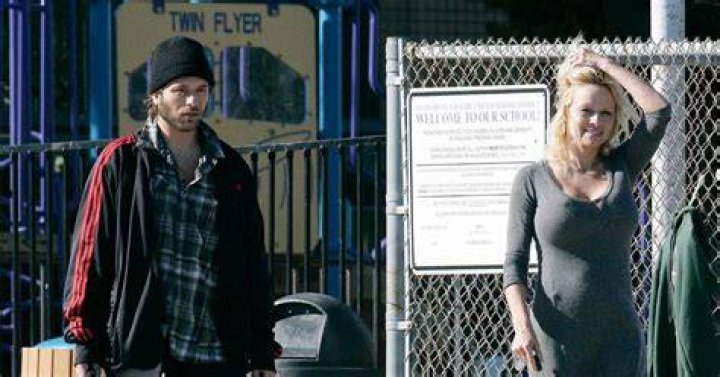 	Pam Anderson & Rick Salomon finalize divorce after she took his dog hostage	