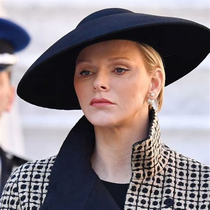 Princess Charlene’s fuchsia lips & Louis Vuitton look: improved or try-hard?