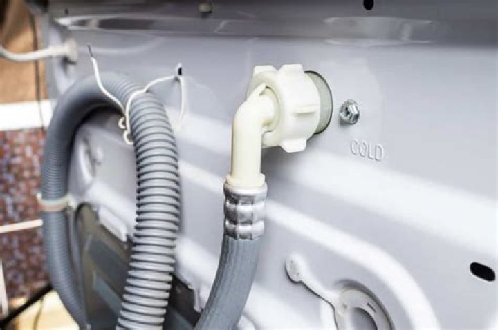 Why does my washing machine plug get hot?